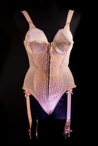 Jean Paul Gaultier (French, b. 1952). Corset-style body suit with garters, 1990, Duchess satin. Worn by Madonna during the “Metropolis” (“Express Yourself”) sequence of the Blond Ambition World Tour (1990). Collection of Madonna, New York